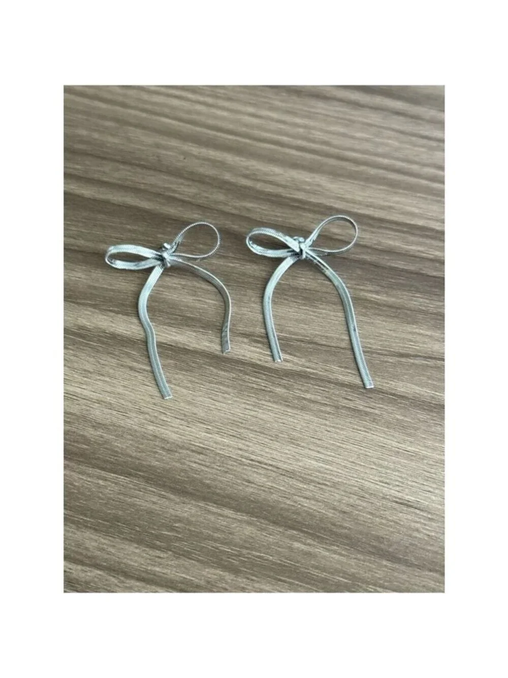 Silver Bow Drop Earrings Q1037